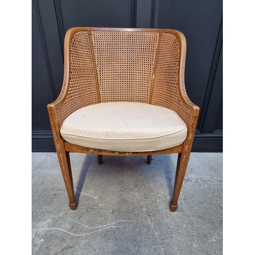 1089 - A pair of late Victorian satinwood, painted and cane tub chairs.  