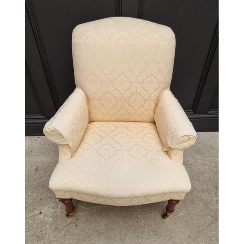 1100 - A reproduction damask upholstered armchair, labelled Balmain & Balmain. 