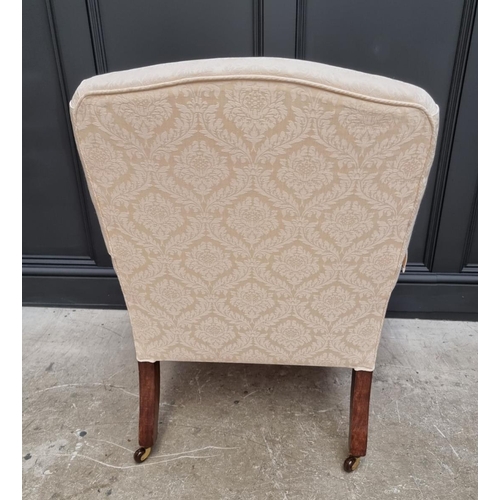 1100 - A reproduction damask upholstered armchair, labelled Balmain & Balmain. 