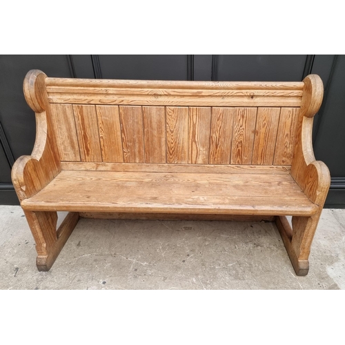 1103 - A Victorian pitch pine pew, 130cm wide. 