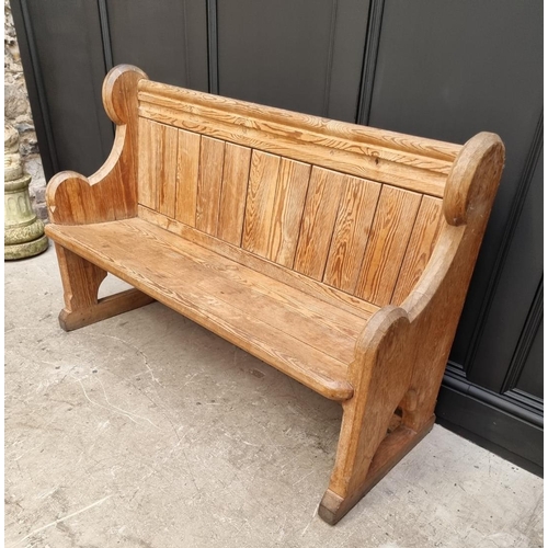 1103 - A Victorian pitch pine pew, 130cm wide. 