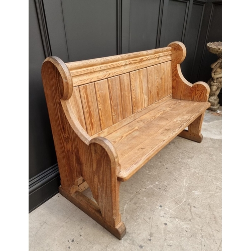 1103 - A Victorian pitch pine pew, 130cm wide. 