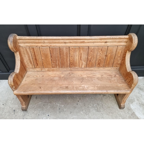 1103 - A Victorian pitch pine pew, 130cm wide. 