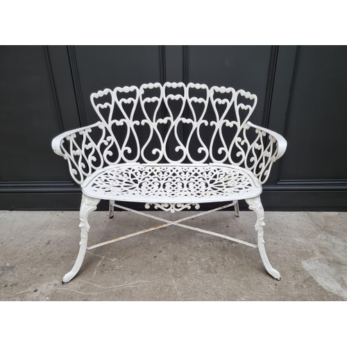 1105 - A white painted aluminium garden suite, comprising: a small bench, 92.5cm wide; a circular table, 78... 