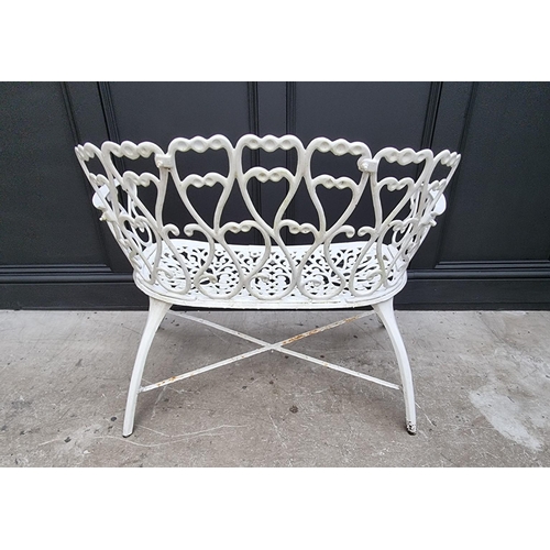 1105 - A white painted aluminium garden suite, comprising: a small bench, 92.5cm wide; a circular table, 78... 