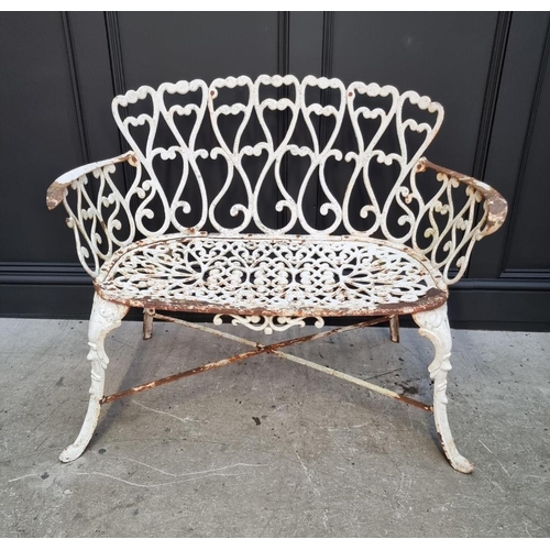 1106 - An old white painted wrought and cast iron bench, 93cm wide. 