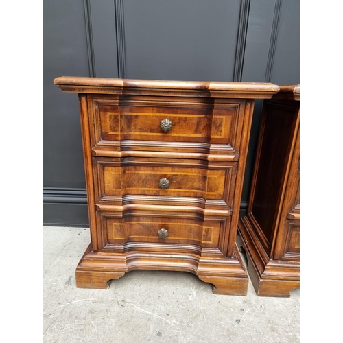 1108 - A pair of hardwood bedside chests, 59.5cm wide.