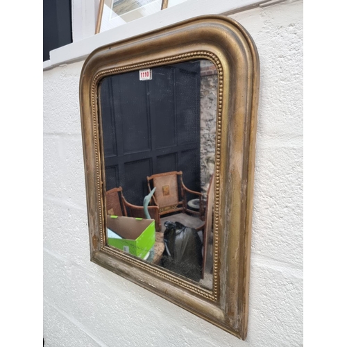 1110 - A small gilt framed wall mirror, 61.5 x 50cm. 