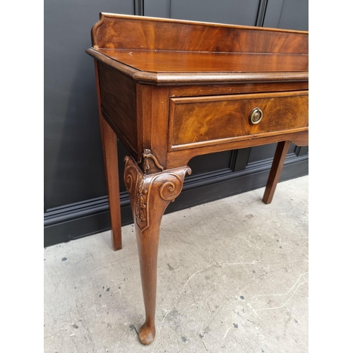 1111 - An old mahogany two drawer serving table, 106cm wide.