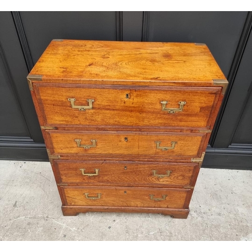 1112 - An unusually small 19th century teak and brass bound campaign chest, with secretaire drawer and side... 