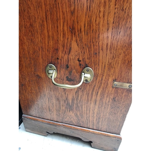 1112 - An unusually small 19th century teak and brass bound campaign chest, with secretaire drawer and side... 