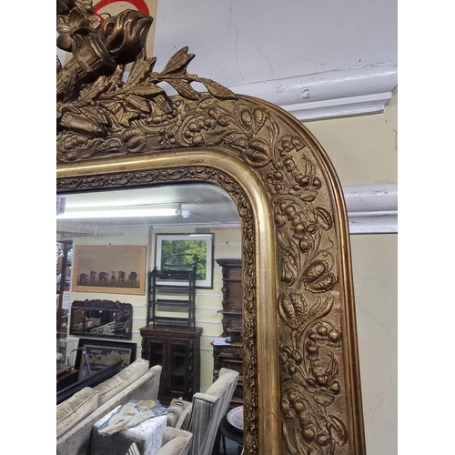 1113 - A late 19th century gilt gesso frame wall mirror, 102.5 x 61.5cm.  