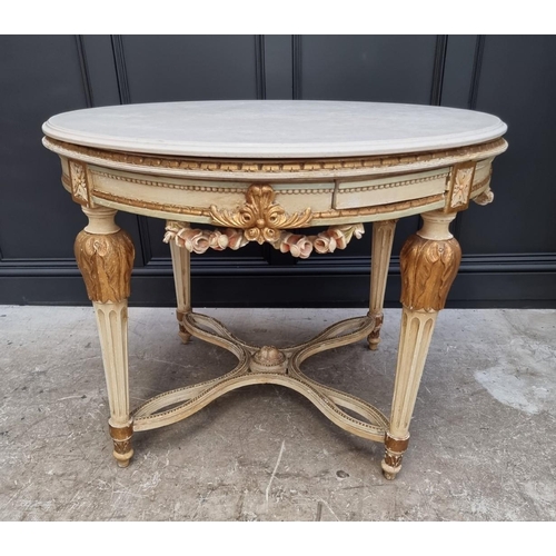 1117 - An old Louis XVI style cream painted and parcel gilt circular centre table, with travertine top and ... 