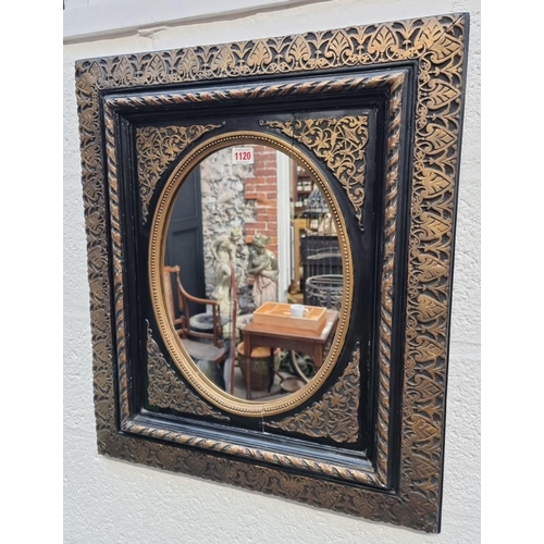 1120 - A black lacquered and parcel gilt framed rectangular wall mirror, 65 x 55.5cm. ... 