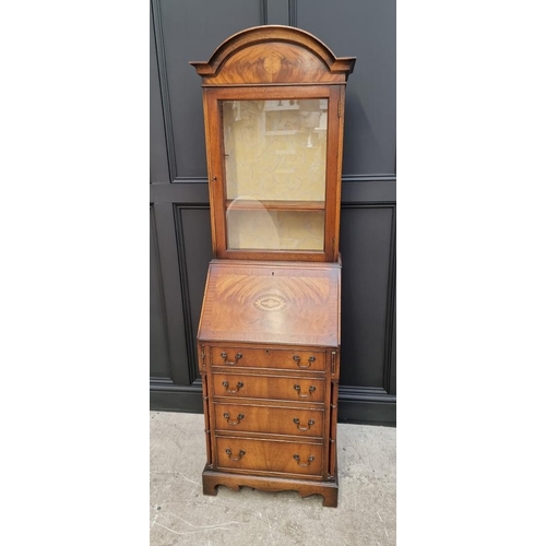 1129 - A good and small reproduction mahogany and inlaid bureau bookcase, 69cm wide. 