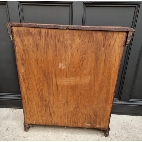 1130 - A late Victorian carved oak bookcase, 91cm wide; together with a 1920s oak and cane open bookcase, 6... 