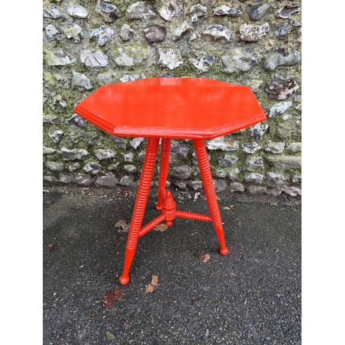 1143 - An antique red painted hexagonal occasional table, in the manner of Liberty, 53cm wide. ... 