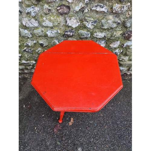 1143 - An antique red painted hexagonal occasional table, in the manner of Liberty, 53cm wide. ... 