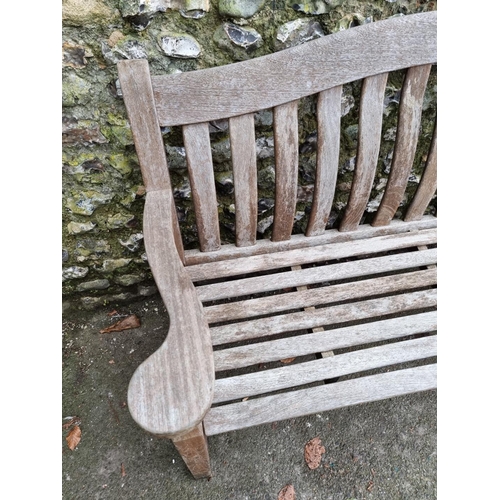 1145 - An Alexander Rose teak garden bench, 155cm wide.