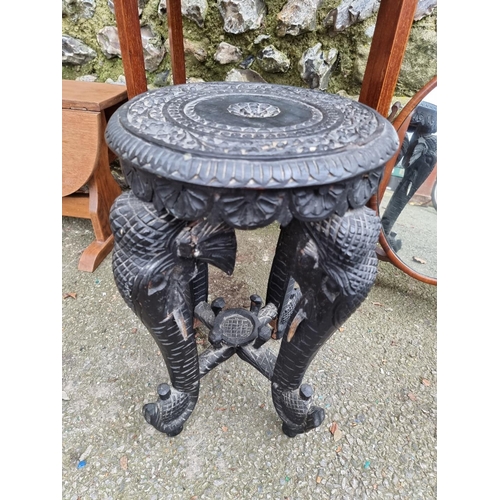 1147 - An Edwardian kidney shaped table, 59cm wide; together with an Eastern carved elephant table; a ... 