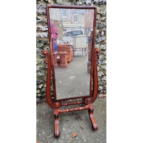 1153 - A 19th century mahogany cheval mirror, 138.5cm high.