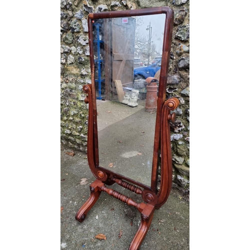 1153 - A 19th century mahogany cheval mirror, 138.5cm high.