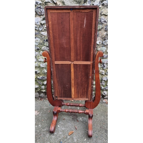 1153 - A 19th century mahogany cheval mirror, 138.5cm high.