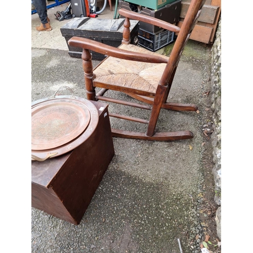 1154 - An oak ladderback rocking chair; together with a small collectors chest; and two copper trays.... 