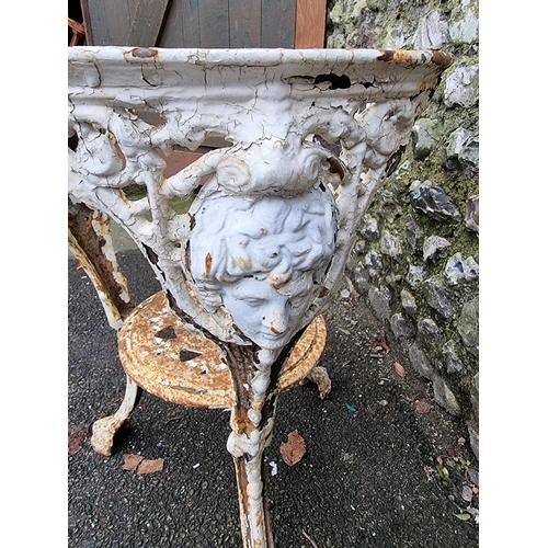 1155 - A Victorian white painted cast iron pub table base, 69cm high x 50cm diameter.