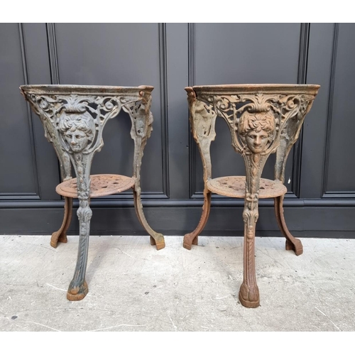 1156 - A pair of cast iron pub table bases, 67cm high x 45cm diameter