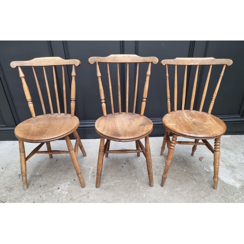 1159 - A pair of beech and elm kitchen chairs; and another. (3)