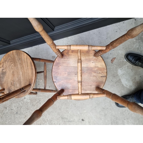 1159 - A pair of beech and elm kitchen chairs; and another. (3)