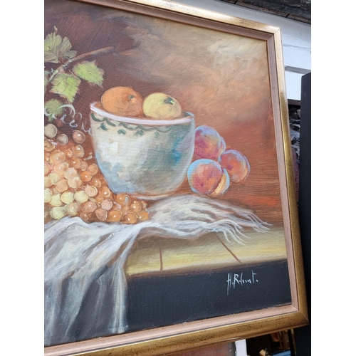 1162 - Hilario Roberto, still life of fruit, signed, oil on canvas, 59 x 98cm; together with another simila... 