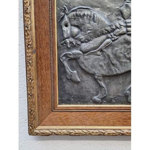 1175 - An antique zinc relief panel of St George, 58 x 48cm. 