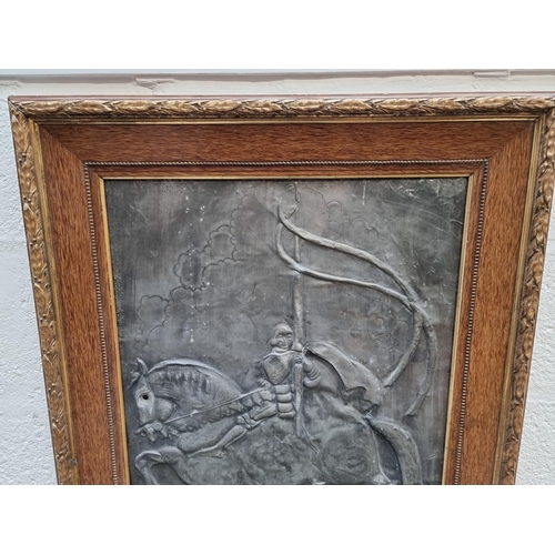 1175 - An antique zinc relief panel of St George, 58 x 48cm. 