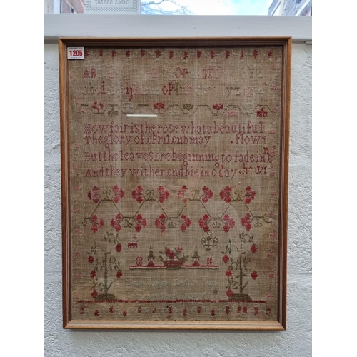 1205 - A William IV needlework sampler, by 'Dinah Rogers, Aged 10, November the 16, 1834', 52 x 40cm.... 