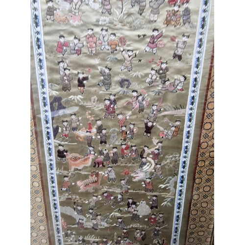 1214 - A Chinese silk embroidered 'Hundred Boys' panel, 65 x 33cm; together with a small quantity of Japane... 