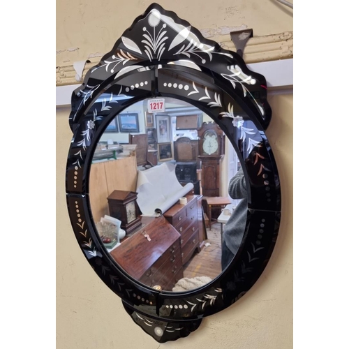 1217 - A small reproduction Venetian style wall mirror, 61 x 42cm.