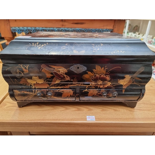 1256 - A Japanese lacquer casket, Meiji, decorated with birds, 39cm wide.