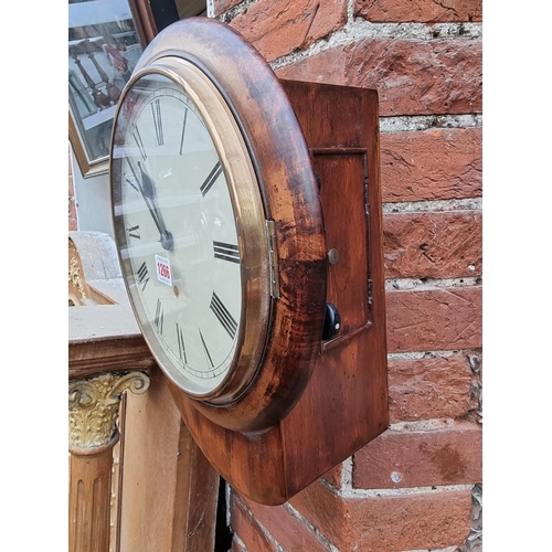 1266 - An old mahogany drop dial wall clock, with 10in painted circular dial, with pendulum.... 