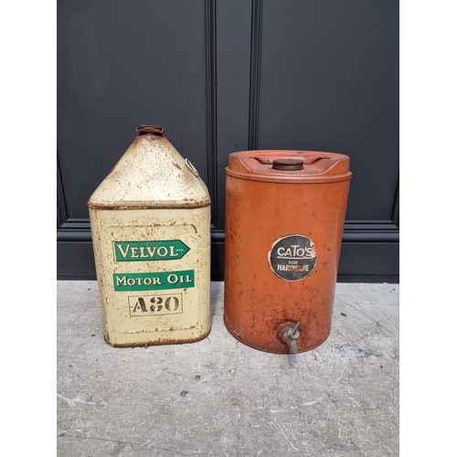 1272 - Automobilia: a vintage 'Velvol Motor Oil' can, 48.5cm high; and another. (2)