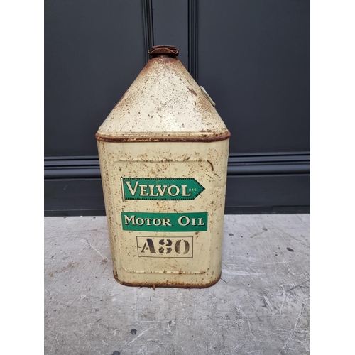 1272 - Automobilia: a vintage 'Velvol Motor Oil' can, 48.5cm high; and another. (2)