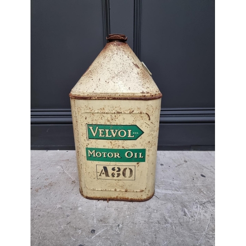 1272 - Automobilia: a vintage 'Velvol Motor Oil' can, 48.5cm high; and another. (2)