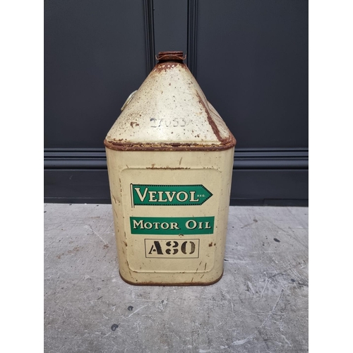 1272 - Automobilia: a vintage 'Velvol Motor Oil' can, 48.5cm high; and another. (2)