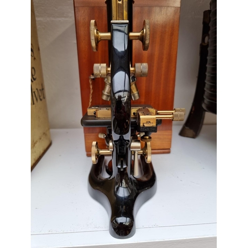 1273 - A 1930s W R Prior microscope, in mahogany case.