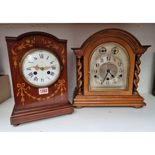 1282 - A late Victorian mahogany and inlaid mantel clock, the enamel dial inscribed 'Dent, London', strikin... 