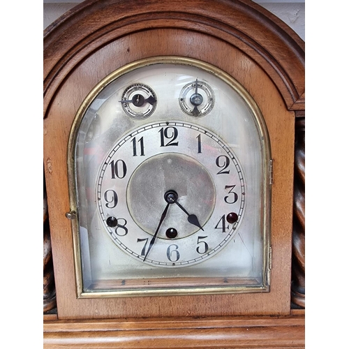 1282 - A late Victorian mahogany and inlaid mantel clock, the enamel dial inscribed 'Dent, London', strikin... 