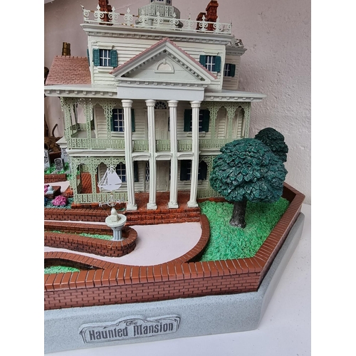 1287 - A Disneyland 'Magical Big Figurines' Haunted Mansion, 40cm wide.