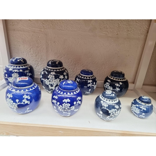 1339 - Eight Chinese blue and white ginger jars and covers, largest 15cm.