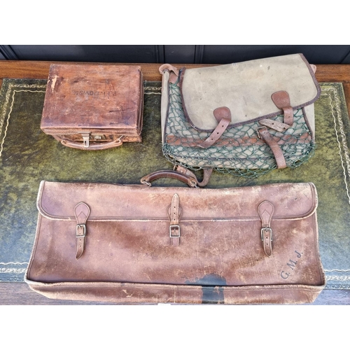 1619 - A vintage green leather toilet case, (lacking contents); together with three other cases. (4)... 